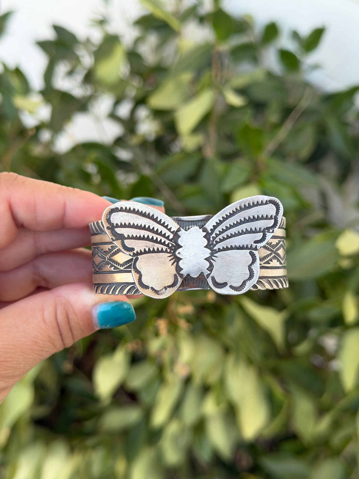 Silver butterfly cuff
