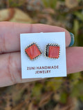 Orange spiny square studs