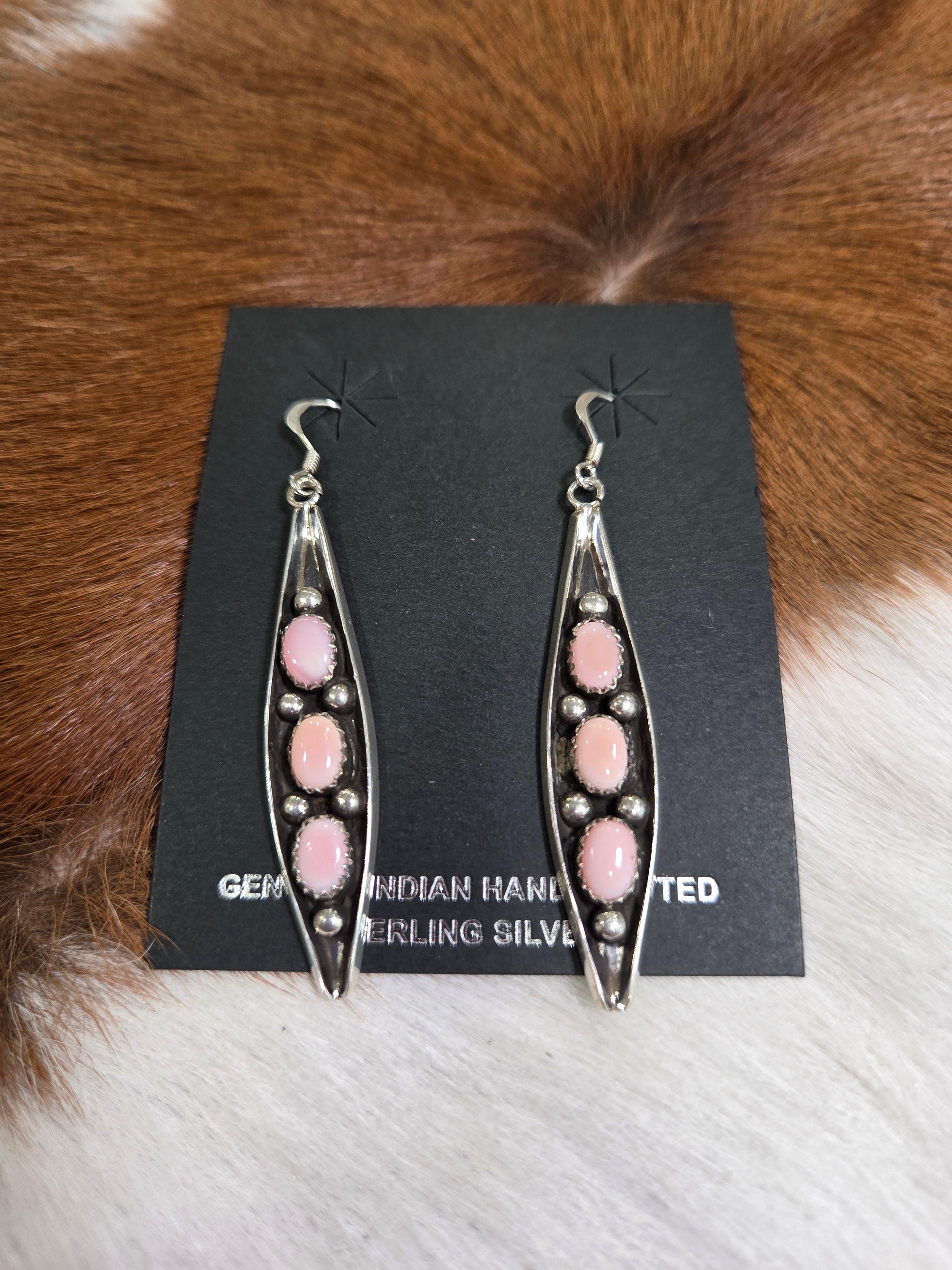 Pink conch dangle earrings