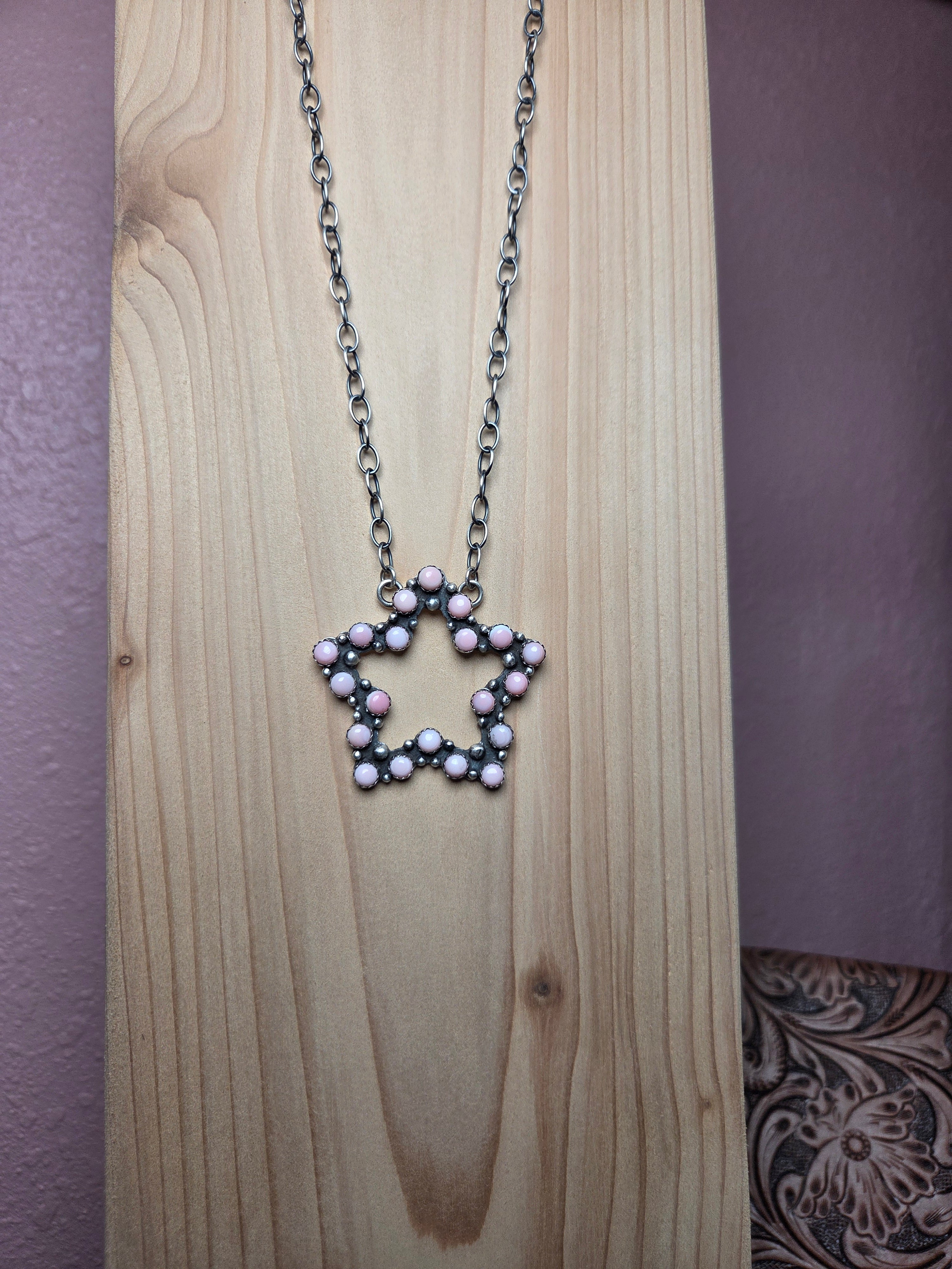 Pink conch star necklace