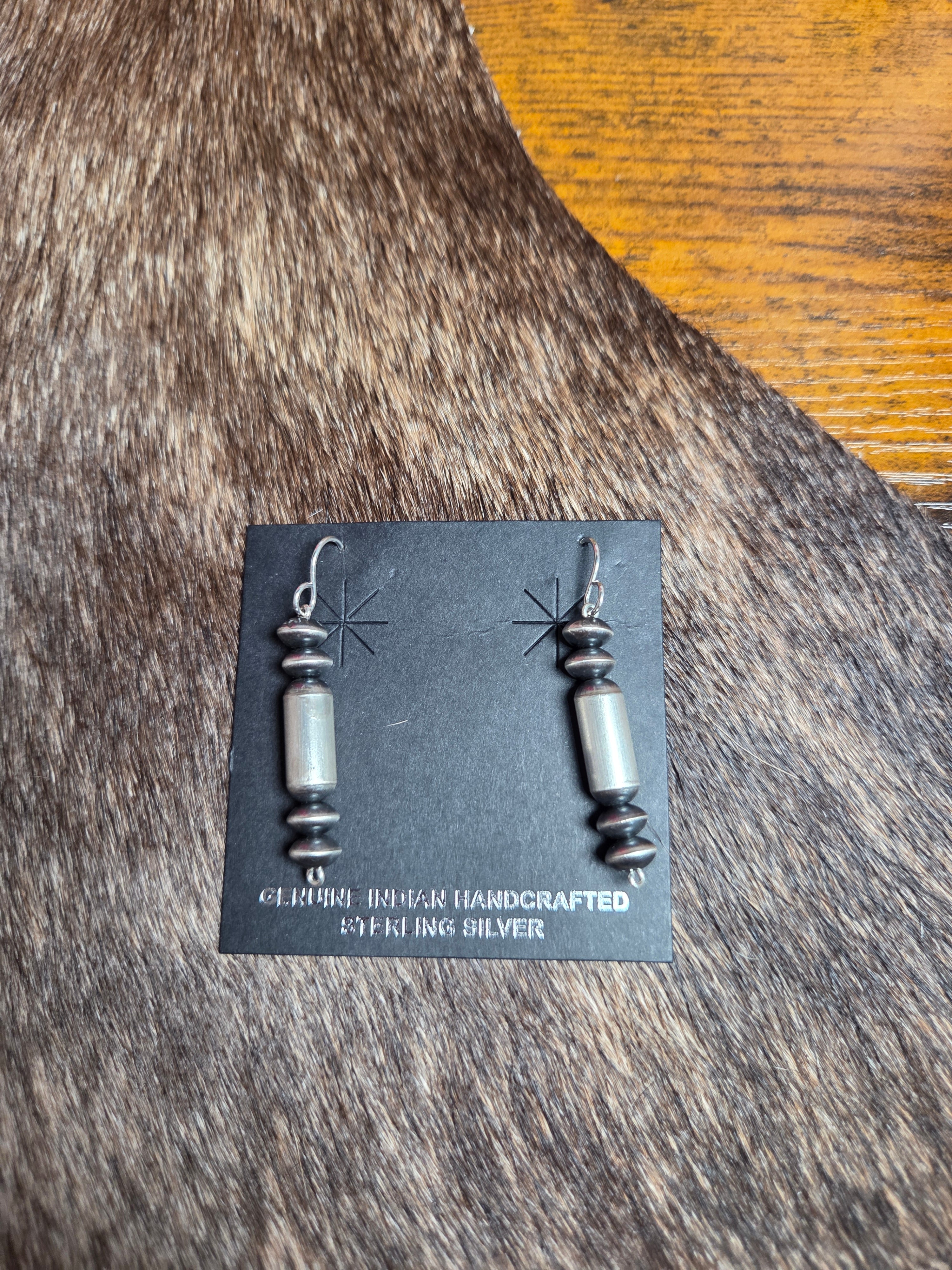 Barrel dangle earrings